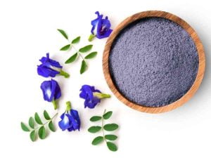 blue matcha powder and tea leafv