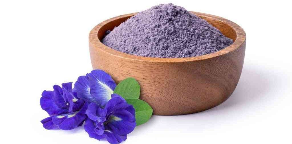 blue matcha powder with tea leaf